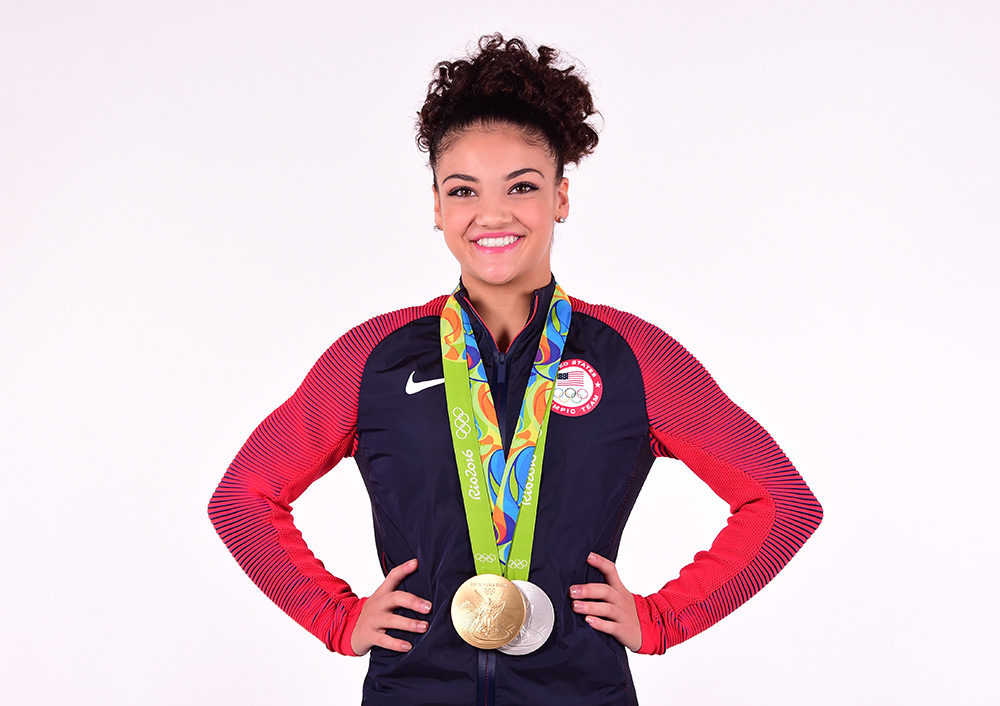 Olympian Laurie Hernandez wearing her Gold and Silver Medals.